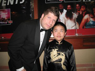 Kevin Sean Michaels and Perry Chen in formal attire at the Annie Awards