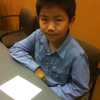 Perry Chen at a table